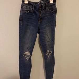 Knee ripped, high rise, super skinny jeans